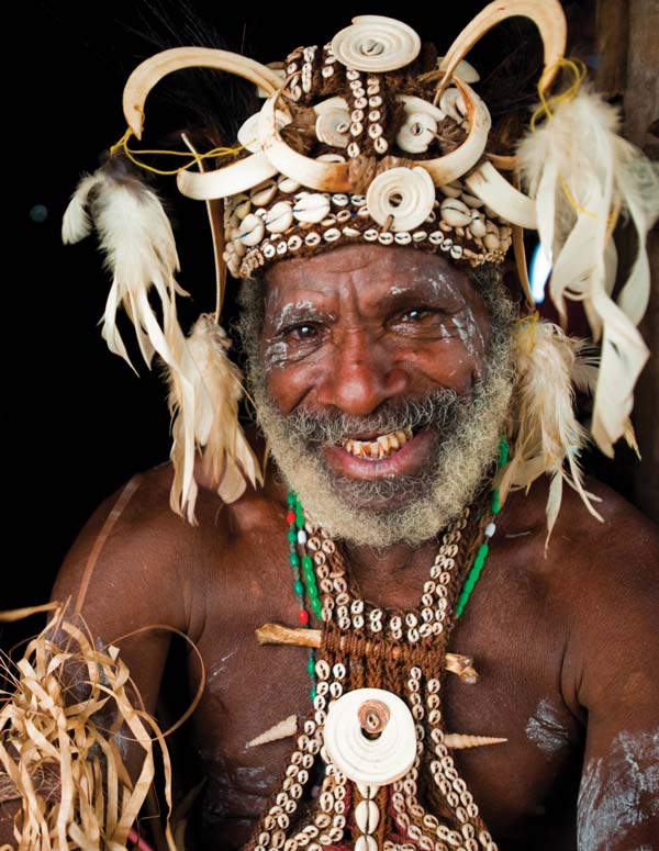 A man from Papua New Guinea in a traditional headdress.